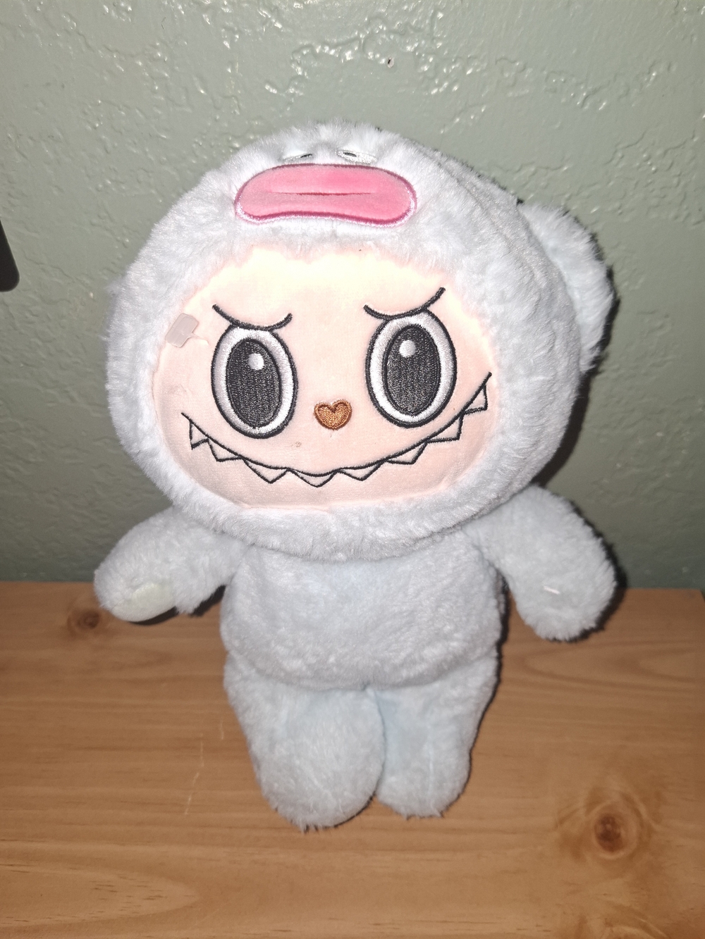 Labubu plush toy from Pop Mart's "The Monsters" ser